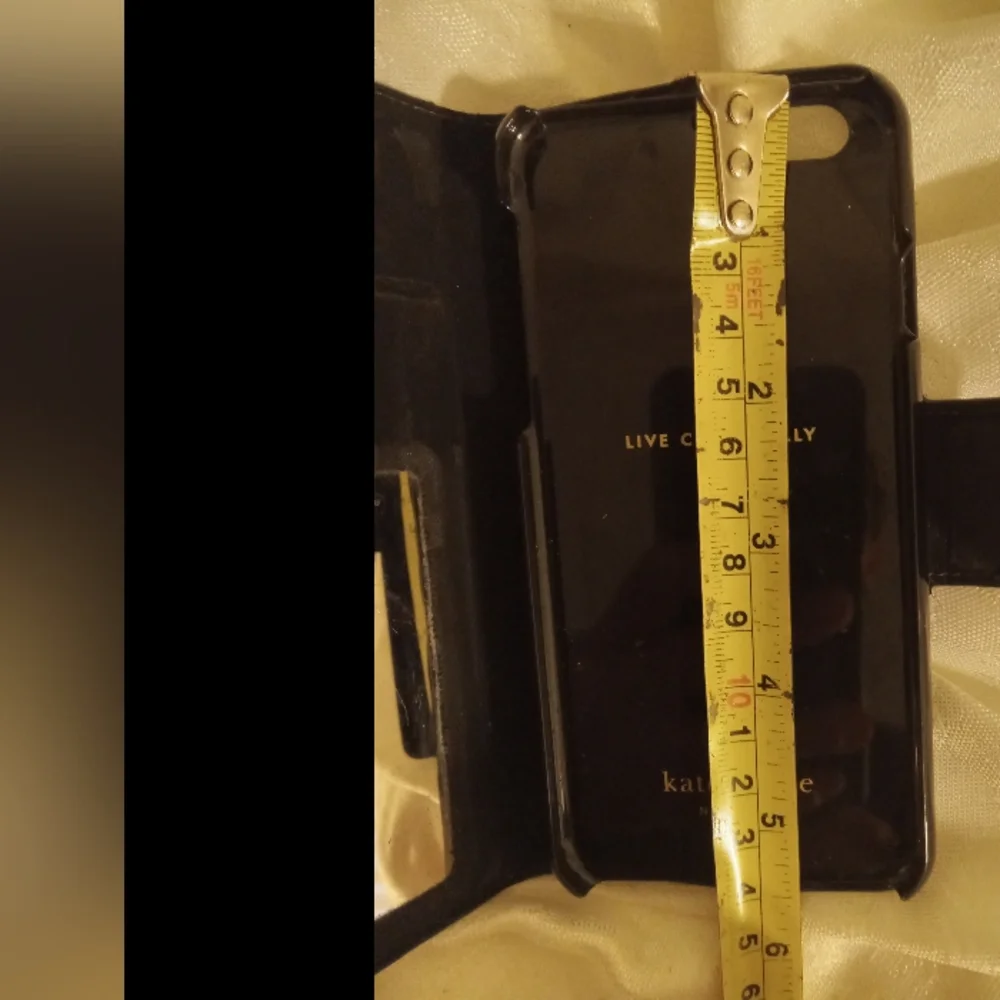 Kate spade Black and white Saffiano leather phone wallet case mirror